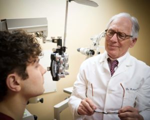 Dr. Ford giving Eye Exam